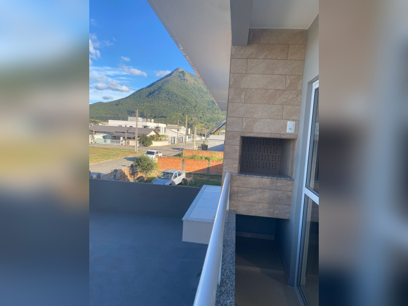 Apartamento à venda Guarda do Cubatão com 57m² e 2 quartos por R$ 335.000 - sacada.jpg