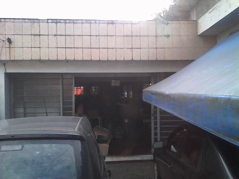 Terreno à venda Jaraguá com 704m² e  quartos por R$ 1.500.000 - 1214328756-frente-da-firma.jpg