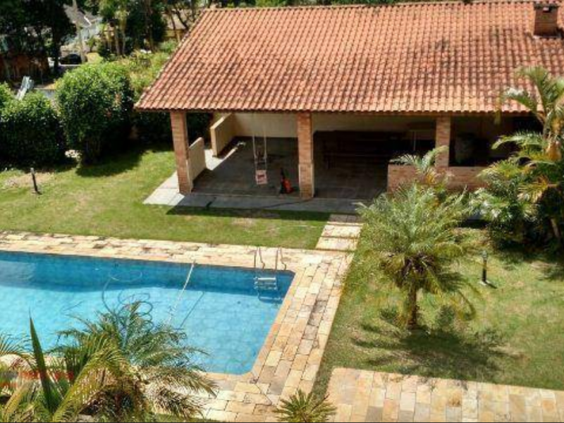 Casa de condomínio à venda Monte Catine com 500m² e 4 quartos por R$ 800.000 - 1127333921-churrasqueira-e-piscina4.PNG