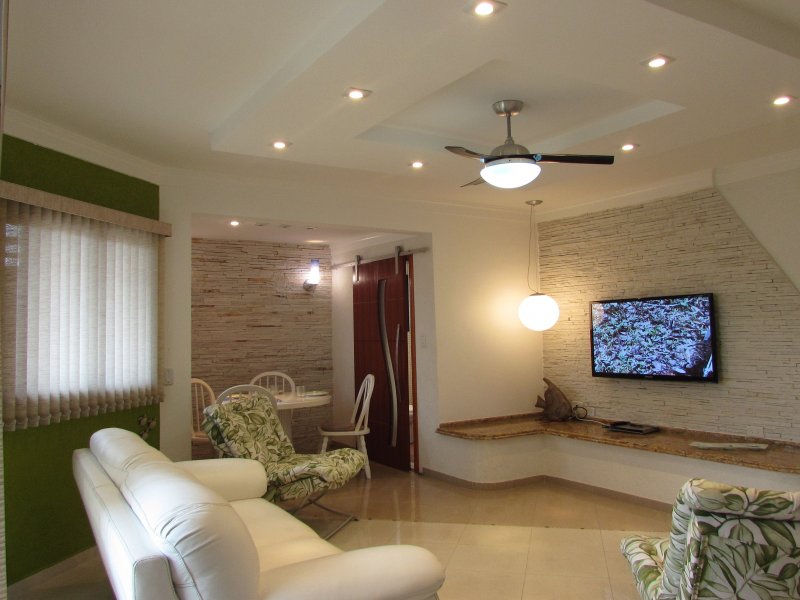 Apartamento à venda Guilhermina com 124m² e 2 quartos por R$ 530.000 - 550750987-a-living-2-ambientes.jpg