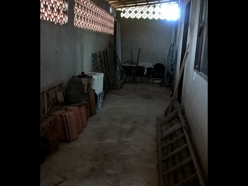 Casa de condomínio para alugar Unamar com 90m² e 2 quartos por R$ 800 - 1263055376-area-dos-fundos-da-casa-2017.jpg