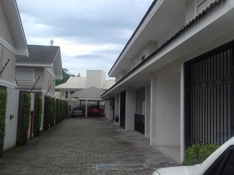Casa de condomínio à venda Lagoa da Conceição com 150m² e 3 quartos por R$ 830.000 - 112037069-patio-garagens-lagoa.jpg