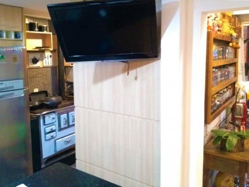 Casa à venda Jardim Passargada I com 180m² e 3 quartos por R$ 700.000 - 1527428379-cozinha-integrada.jpg