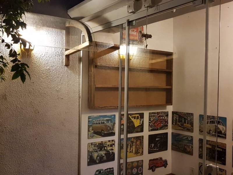 Casa à venda Jardim Passargada I com 180m² e 3 quartos por R$ 700.000 - 1942338519-quintal.jpg