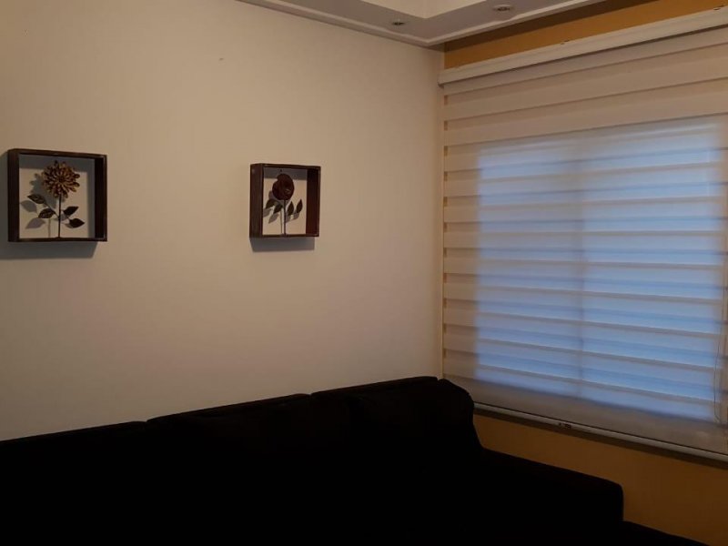 Casa à venda Jardim Passargada I com 180m² e 3 quartos por R$ 700.000 - 1946061024-sala.jpg