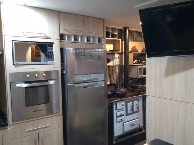 Casa à venda Jardim Passargada I com 180m² e 3 quartos por R$ 700.000 - 709091196-cozinha3.jpg