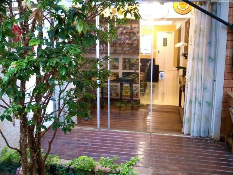 Casa à venda Jardim Passargada I com 180m² e 3 quartos por R$ 700.000 - 858763956-quintal-visto-de-frente.jpg