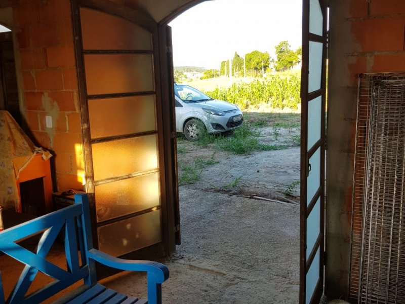 Chácara à venda Carafa com 1500m² e 3 quartos por R$ 170.000 - 634180508-sala-porta.jpeg