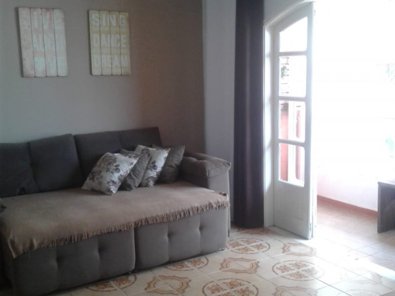 Apartamento à venda Vl. Tupi com 90m² e 2 quartos por R$ 300.000 - 1525332677-apto-sala.jpeg