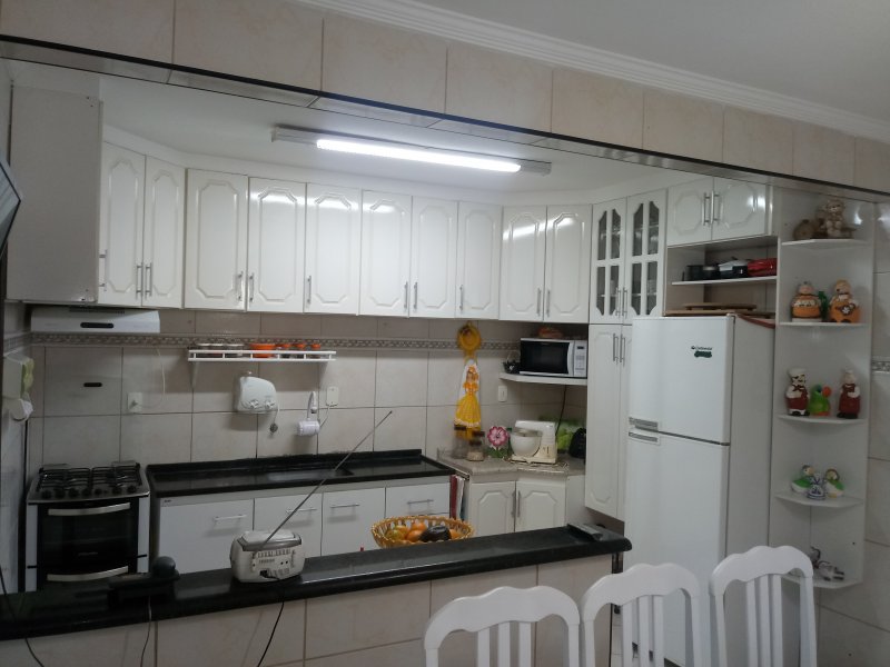 Casa à venda Nova Mirim com 160m² e 3 quartos por R$ 460.000 - 1957649111-cozinha.jpg