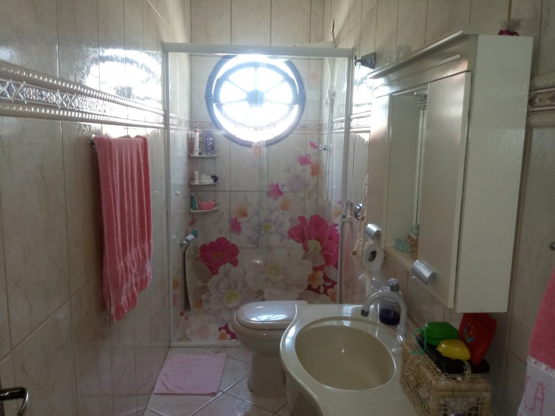Casa à venda Nova Mirim com 160m² e 3 quartos por R$ 460.000 - 549754595-banheiro-suite-secundaria.jpg