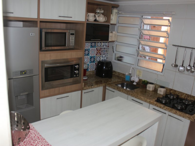 Casa de condomínio à venda Vila Monte Serrat com 70m² e 2 quartos por R$ 260.000 - 1023876853-cozinha37.JPG