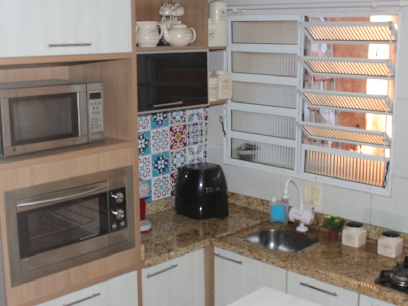 Casa de condomínio à venda Vila Monte Serrat com 70m² e 2 quartos por R$ 260.000 - 1223724356-cozinha27.JPG