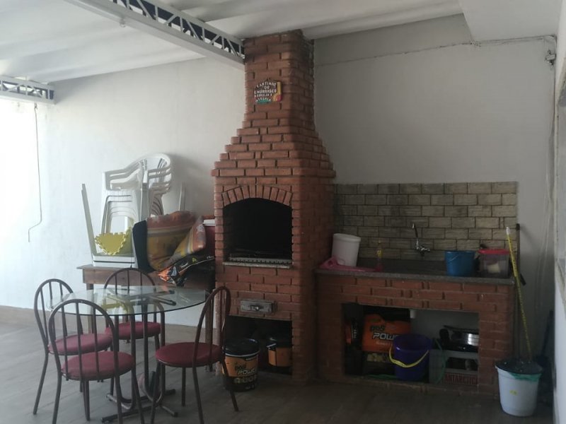 Casa à venda Conjunto Habitacional Águia de Haia com 306m² e 4 quartos por R$ 380.000 - 1717501520-12-area-churrasqueira-superior.jpeg