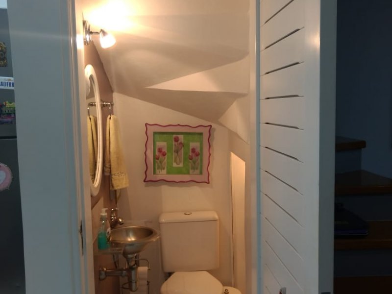 Casa de condomínio à venda Sarandi com 90m² e 2 quartos por R$ 435.000 - 2059154711-6-lavabo.jpeg
