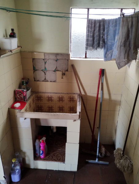 Casa à venda Jardim Rodolfo Pirani com 164m² e 3 quartos por R$ 450.000 - 1482915006-lavanderia.jpeg