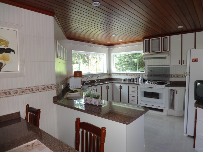 Casa de condomínio à venda Centro com 450m² e 4 quartos por R$ 1.500.000 - 1387762724-15-cozinha.jpg