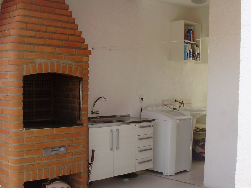 Casa de condomínio à venda Wanel Ville com 68m² e 3 quartos por R$ 299.000 - 1035135757-quintal-5.JPG