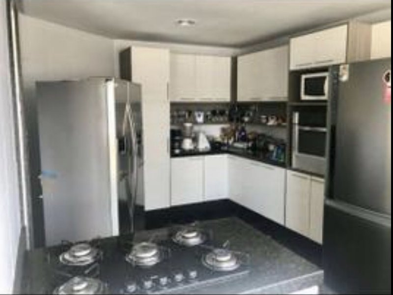 Casa de condomínio à venda Centro com 320m² e 4 quartos por R$ 1.000.000 - 1402498419-ca4a5d2b-a2fe-4133-b795-6566d3d0efb9.jpeg