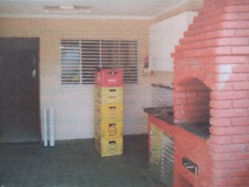 Casa à venda Vila Nilo com 102m² e 3 quartos por R$ 335.000 - 1653439763-9-varanda-mostrando-porta-janela-cozinha.jpg