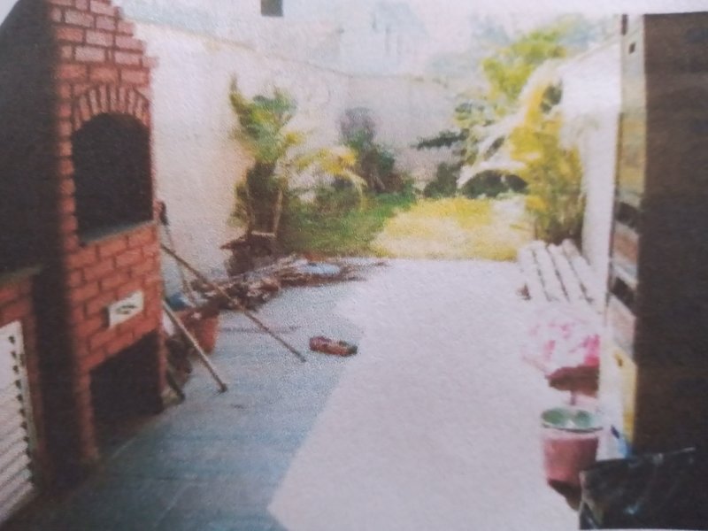 Casa à venda Vila Nilo com 102m² e 3 quartos por R$ 335.000 - 649324538-varandacobertadoinicioparaoquintaldescoberto.jpg