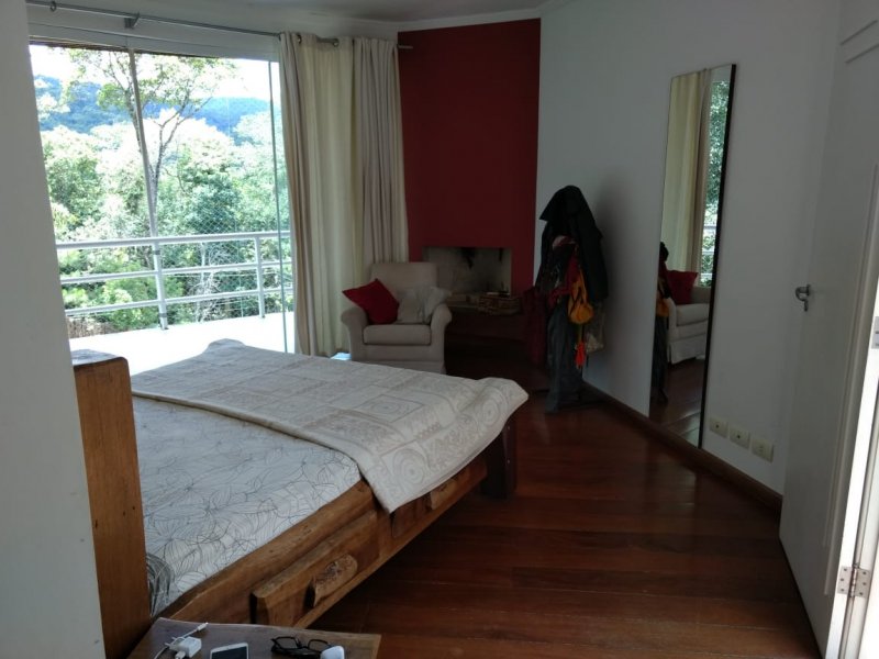 Casa de condomínio à venda Centro com 400m² e 3 quartos por R$ 1.680.000 - 1572978451-foto-21-suite-master-com-lareira.jpg