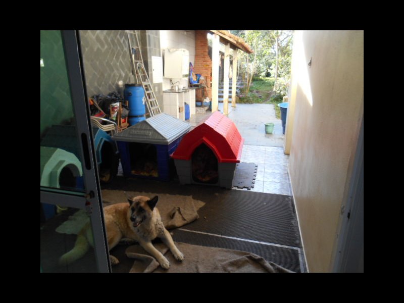 Casa à venda Suíssa com 275m² e 3 quartos por R$ 850.000 - 1886464348-vista-da-sala-de-jantar-para-a-area-da-churrasqueira-copy.JPG