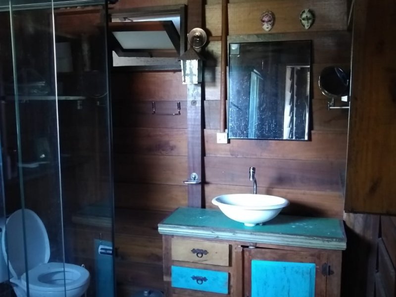 Casa à venda Lagoa da Conceição com 100m² e 1 quarto por R$ 630.000 - 966300689-banheiro-suite-morro-da-lagoa.jpg