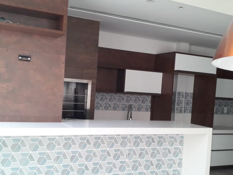 Casa de condomínio à venda Centro com 220m² e 5 quartos por R$ 1.300.000 - 2036217345-churrasqueira-area-gourmet.jpeg