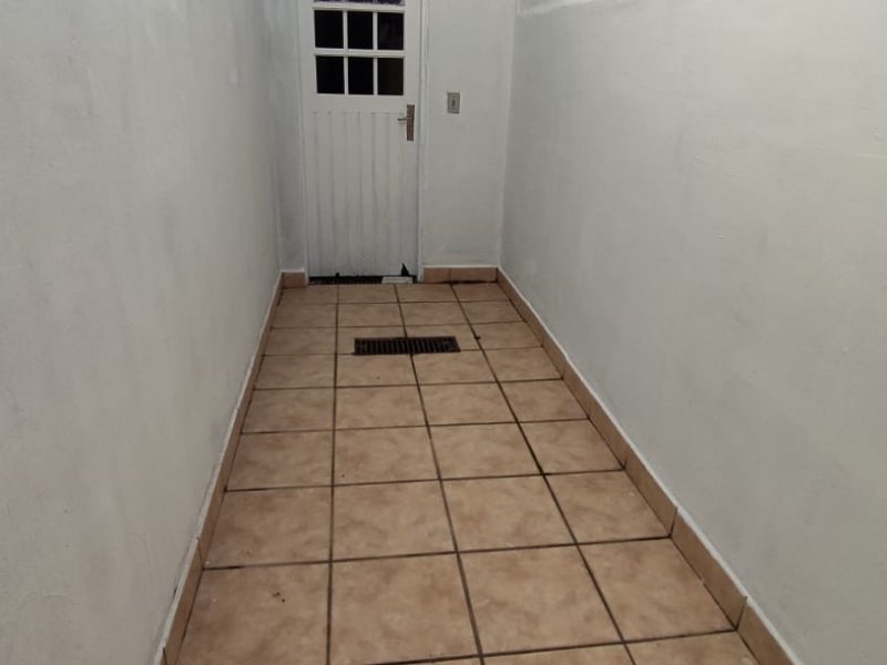 Casa à venda Vilamar com 113m² e 3 quartos por R$ 450.000 - 1625550514-deposito-corredor-acesso.jpeg