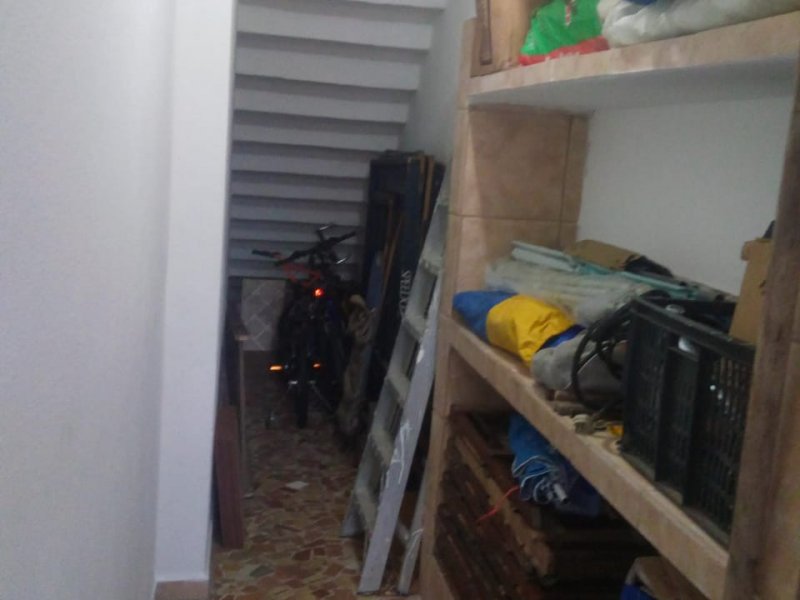 Casa à venda Vilamar com 113m² e 3 quartos por R$ 450.000 - 732522218-deposito.jpg