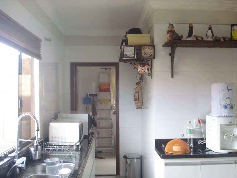 Kitnet à venda CA 9 (Centro de Atividades) com 26m² e 1 quarto por R$ 245.000 - 1631295242-cozinha-vista-para-area-de-servico.JPG