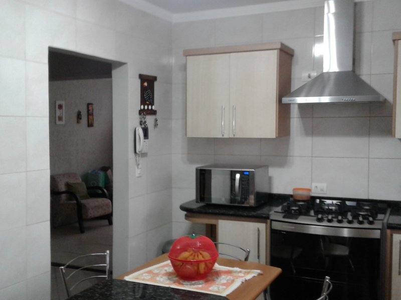 Casa à venda Camargos com 295m² e 4 quartos por R$ 819.000 - 2069387919-cozinha-planejada-com-coifa.jpg