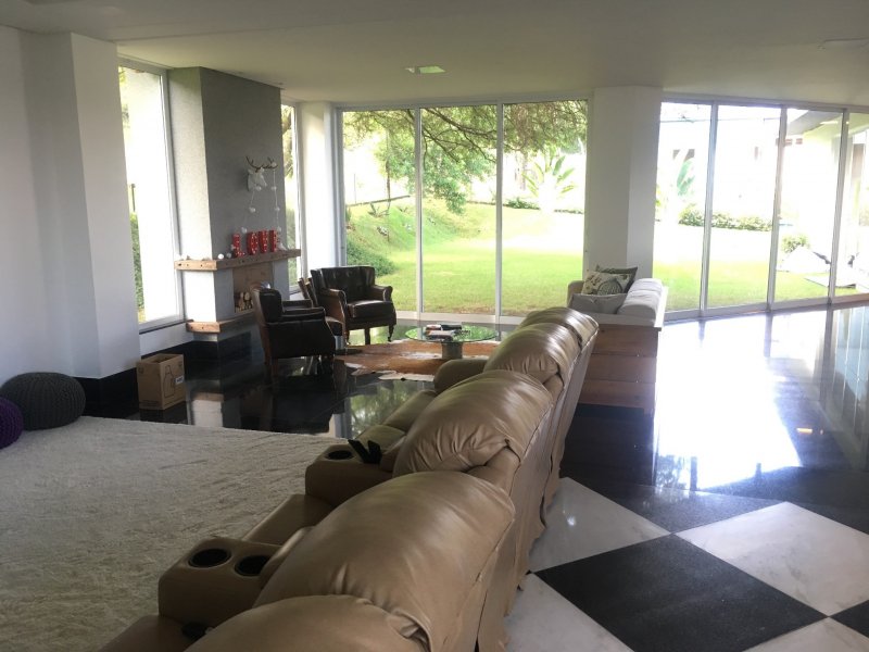 Casa de condomínio à venda Res. Aldeia do Vale com 583m² e 4 quartos por R$ 3.990.000 - 618057733-15-sala-de-tv-lareira.JPG