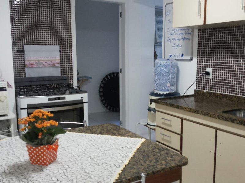 Apartamento à venda Centro com 92m² e 3 quartos por R$ 590.000 - 626623147-cozinha.jpg