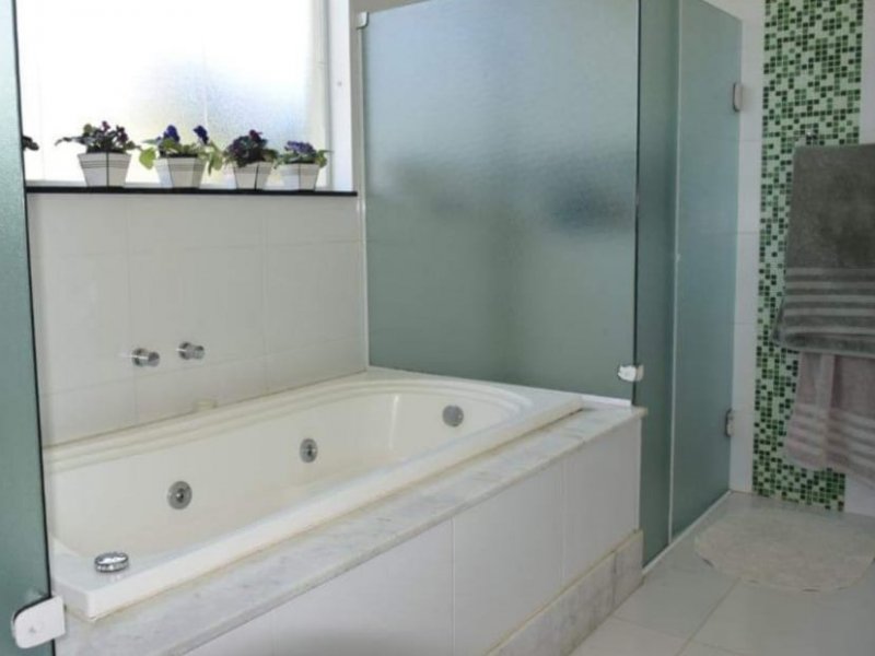 Casa de condomínio à venda Guaxinduva com 400m² e 4 quartos por R$ 2.500.000 - 1342119103-banho-suite-master.jpg