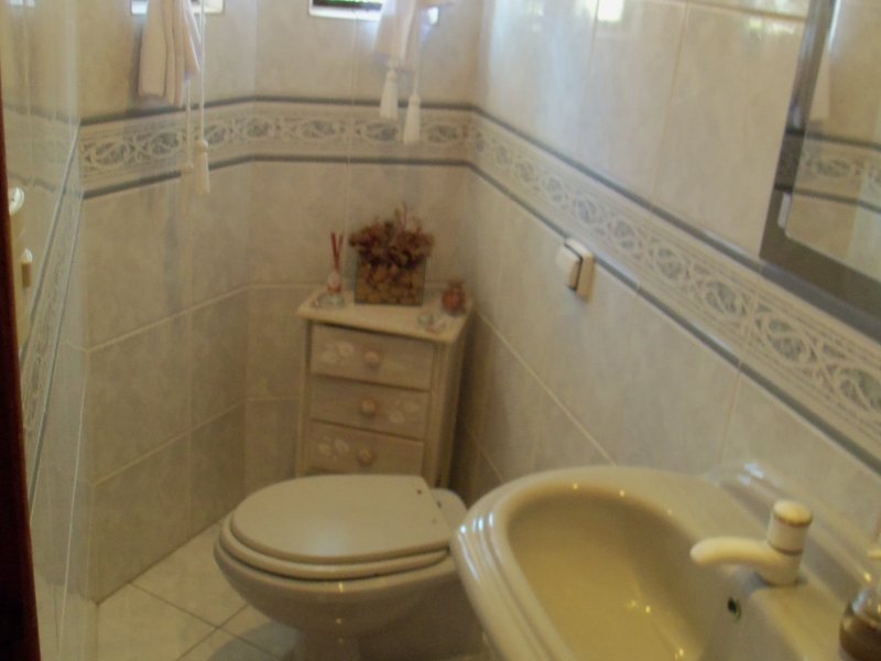 Casa de condomínio à venda Parque dos Pássaros com 510m² e 4 quartos por R$ 1.300.000 - 393139498-lavabo.JPG