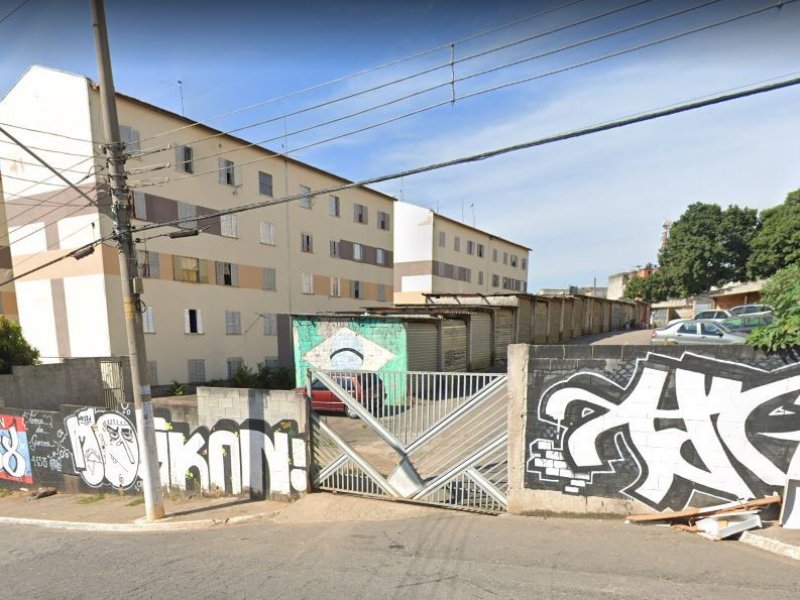 Apartamento à venda Itaim Paulista com 47m² e 2 quartos por R$ 65.000 - 207249060-frente-do-predio-com-estacionamento.JPG