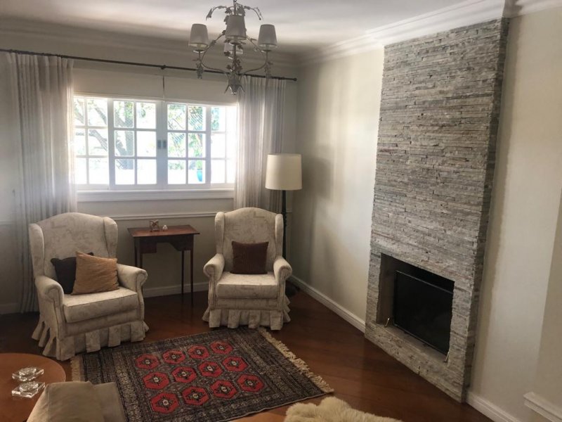 Casa de condomínio à venda Alphaville com 374m² e 4 quartos por R$ 2.370.000 - 1394136248-sala-da-lareira.jpg