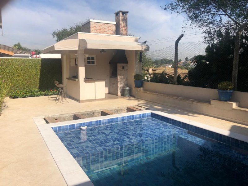Casa de condomínio à venda Alphaville com 374m² e 4 quartos por R$ 2.370.000 - 2117876176-piscina-e-churrasqueira.jpg