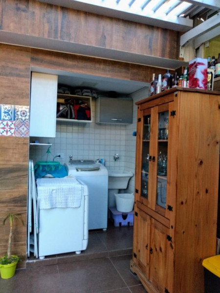 Cobertura à venda Parque Santo Antonio com 120m² e 2 quartos por R$ 450.000 - 1871986995-lavanderia-1b.jpg