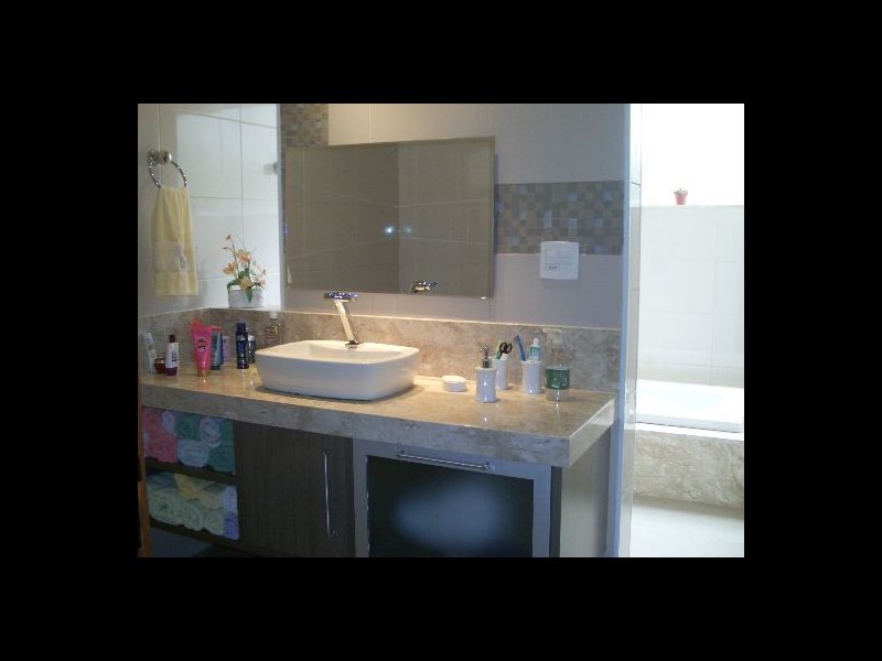 Casa à venda Jardim Guaiuba com 300m² e 3 quartos por R$ 1.120.000 - 2139203001-suite-terreo.jpg