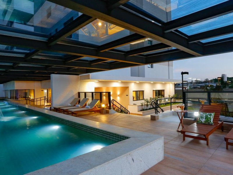 Apartamento à venda Alphaville Flamboyant Residencial Araguaia com 105m² e 3 quartos por R$ 520.000 - 393617650-piscina.jpg