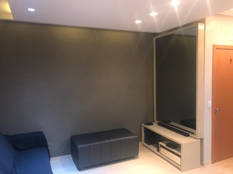 Apartamento à venda Vale dos Tucanos com 76m² e 3 quartos por R$ 355.000 - 101790327-sala-e-painel-de-tv.jpeg