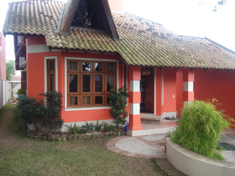 Casa à venda Centro com 105m² e 3 quartos por R$ 420.000 - 1294403288-frente-casa-patio.jpg