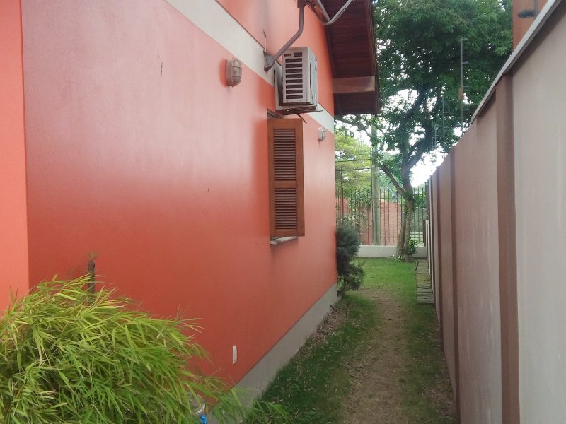 Casa à venda Centro com 105m² e 3 quartos por R$ 420.000 - 302903269-visao-patio-corredor-vizinho.jpg