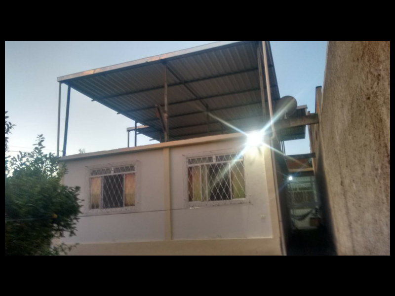 Casa à venda Trevo com 200m² e 3 quartos por R$ 800.000 - 1878379879-frente-janelas.png