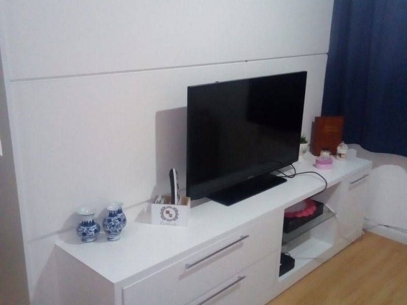 Apartamento à venda Bandeiras com 57m² e 2 quartos por R$ 230.000 - 1296636402-foto-painel-da-sala3.jpeg