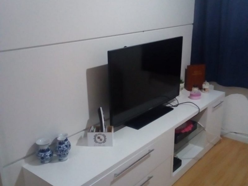 Apartamento à venda Bandeiras com 57m² e 2 quartos por R$ 230.000 - 1330078120-foto-painel-da-sala2.jpeg