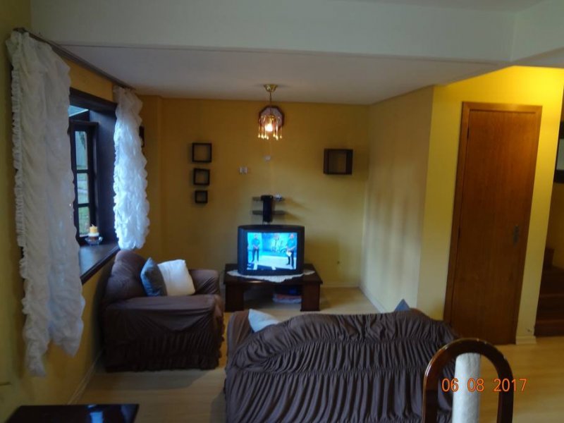 Casa de condomínio à venda Vl. Suzana com 133m² e 4 quartos por R$ 605.000 - 1050638135-sala1.jpg